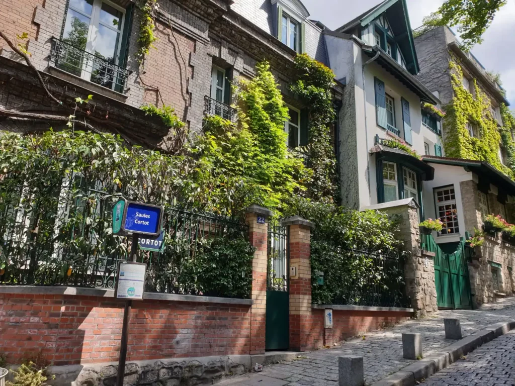 Montmartre Walking Tour - House with Flowers and Plants - MyMontmartre Tours Rue Cortot - Hidden gem on a walking tour of Montmartre